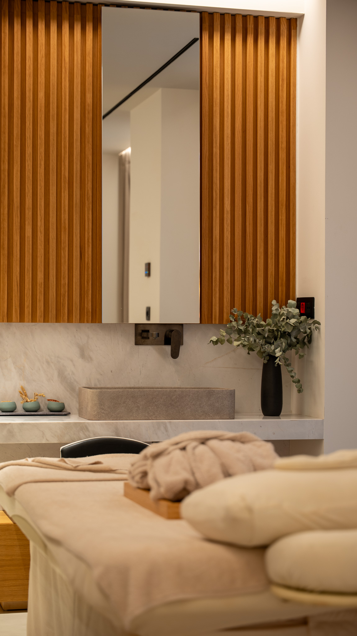 Dusit Suites Athens, spa-bath vanity in oak slats with concrete vessel sink