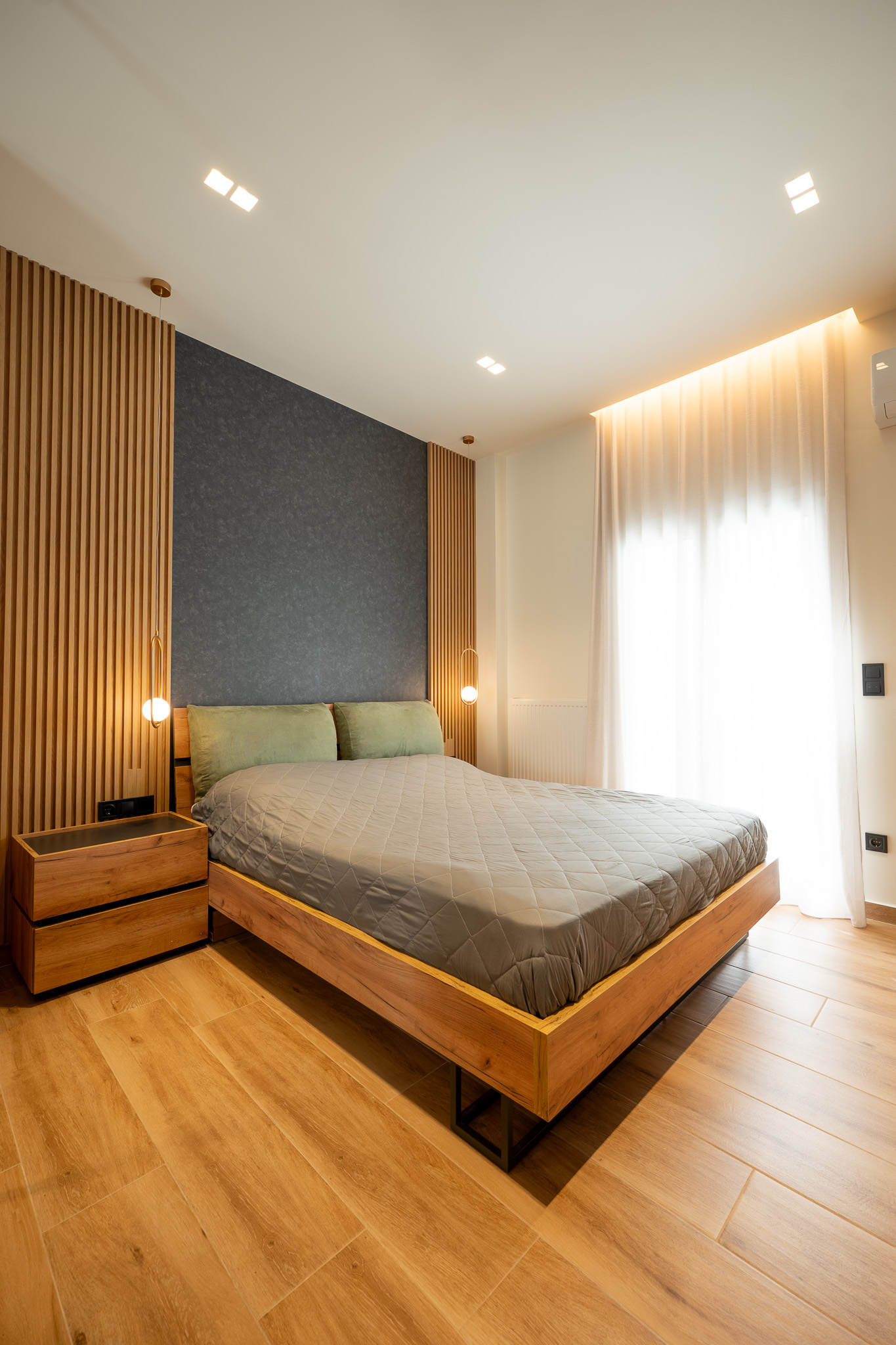 A&K Chorothetisis, master bedroom with vertical oak slat headboard wall and balcony glow