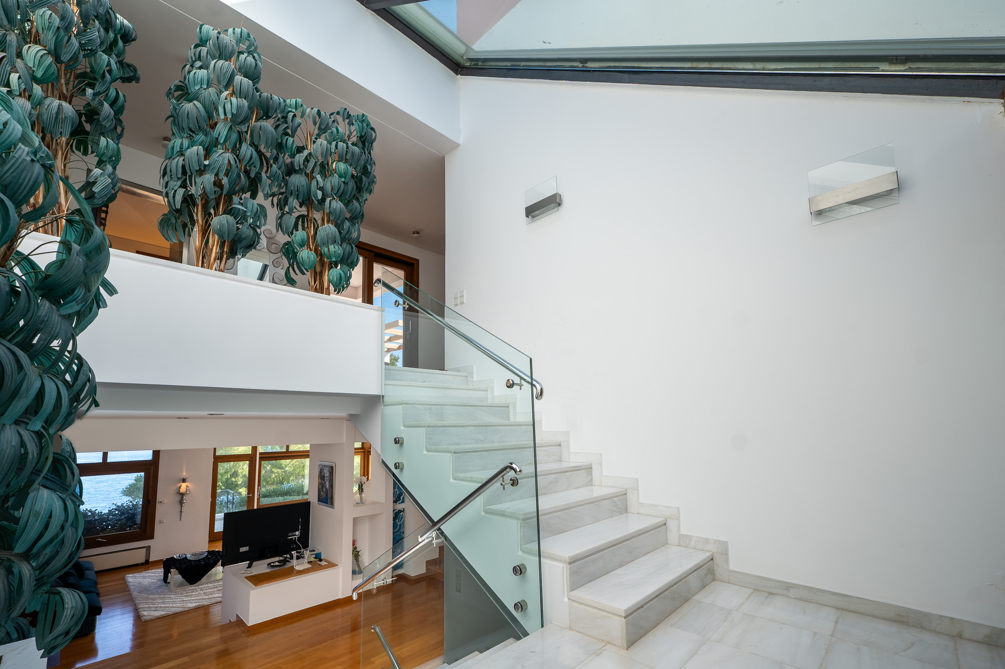 Villa Selene, upper marble landing overlooking living below